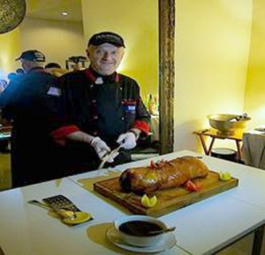 Chef Antonios Kouroutsavoris conducts a cooking demonstration