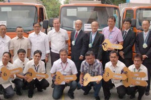 Japanese Ambassador Toshinao Urabe (center, standing) led the turn over ceremony of mobile drainage pumps to different regions in the country. Regional representatives accepted the disaster preparedness equipment, led by Department of Public Works and Highways Secretary Rogelio Singson (fourth from left, standing)
