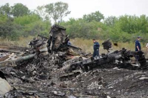 Rescuers stand on Friday on the site of the crash of a Malaysian airliner carrying 298 people from Amsterdam to Kuala Lumpur, near the town of Shaktarsk, in rebel-held east Ukraine. AFP PHOTO