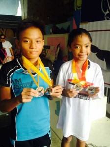 Quezon’s Enya Viktoria Mercurio and Cavite’s John Angelo Vargas (left) lead the opening day winners in the Philippine Swimming League’s (PSL) 62nd PSLMagnolia Motivational Swimming Meet on Saturday at the Diliman Preparatory School swimming pool in Quezon City. CONTRIBUTED PHOTO