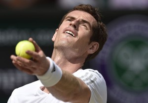 Britain’s Andy Murray serves to Bulgaria’s Grigor Dimitrov during their men’s singles quarterfinals match on Day 9 of the 2014 Wimbledon Championships at The All England Tennis Club in Wimbledon, southwest London. AFP PHOTO