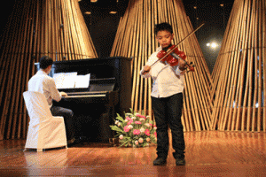  Enrico Louise Tobias performs at a Centex program recital