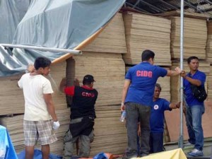 Police personnel inspect substandard construction materials found in a warehouse in Barangay Nula-Tula, Tacloban City worth P15 million. PNA PHOTO COURTESY OF CIDG