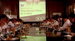 President Benigno Aquino 3rd (fourth from right) presides over the budget presentation meeting on Friday attended by Cabinet members, including Budget Secretary Florencio 