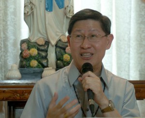 Luis Antonio Cardinal Tagle announces the visit of the Pope to the Philippines during a press conference at the Pope Pius XII Catholic Center in Manila on Monday. PHOTO BY EDWIN MULI