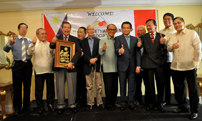  Former President Fidel V. Ramos (center) and Vietnamese Ambassador to the Philippines Truong Trieu Duong (5th from right) led the launching of the Philippine-Vietnam Friendship Association Inc. (PVFA) at Manila Hotel on Tuesday. With them are (from left) Herman Tiu Laurel, Kalayaan College Vice President Gonzalo Jurado, PVFA Co- Founder and President Eddie Ilarde, Publishers Association of the Philippines Inc. President and Asean Times Publisher & Editor-in-chief Luis Arriola, The Manila Times Editorial Consultant Alfredo Dela Rosa, Philippines Center for Advance Studies Consultant Ernesto Banawis, Laguna State Polytechnic University President Ricardo Wagan, PNOC Exploration Corporation Board Member Luis Ma. Uranza and Rodrigo Domingo Jr. PHOTO BY EDWIN MULI