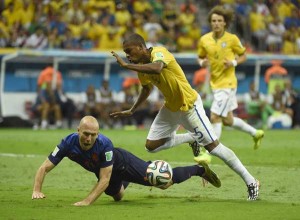 Brazil’s midfielder Fernandinho (R) and Netherlands’ forward Arjen Robben vie during the third place playoff football match between Brazil and Netherlands during the 2014 FIFA World Cup at the National Stadium in Brasilia. AFP PHOTO