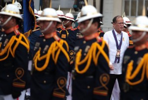  President Benigno Aquino 3rd troops the line during the 113th Police Service Anniversary at the PNP Multi-Purpose Center, Camp Crame in Quezon City on Friday. MALACAÑANG PHOTO 