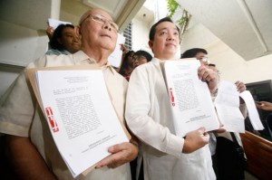 Alliance of Concerned Teachers party- list Rep. Antonio Tinio and National Artist Bienvenido Lumbera lead teachers in filing the fourth impeachment complaint against President Benigno Aquino 3rd at the House of Representatives in Quezon City on Monday. PHOTO BY MIGUEL DE GUZMAN 