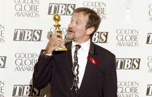 A file picture taken on January 22, 1994 in Beverly Hills, shows US actor Robin Williams posing with his best actor in a musical or comedy award during the Golden Globe ceremony. AFP PHOTO 