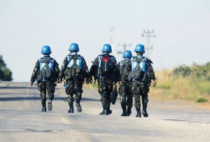  Peacekeepers from the Philippines cross the israeli army crossing of Quneitra between syria and golan heights in this file photo. aFP PHoto