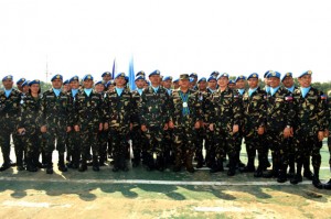  A handout photo taken on October 2013 by Armed Forces shows officers and men of the 7th Philippine peacekeeping force bound for the Golan Heights during their send-off ceremony. AFP PHOTO 