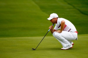 Sergio Garcia of Spain lines up a putt on the 18th green during the third round of the World Golf Championships- Bridgestone Invitational at Firestone Country Club South Course in Akron, Ohio. AFP PHOTO 