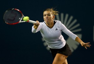 Simona Halep of Romania returns a shot to Magdalena Rybarikova of Slovakia during the Connecticut Open at the Connecticut Tennis Center at Yale in New Haven, Connecticut. AFP PHOTO