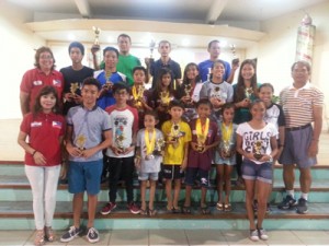 Philippine Swimming League President Susan Papa, Secretary General Maria Susan Benasa, Secretariat Head Guia Llaguno and Technical Head Ed Mascardo with the Most Outstanding Swimmer awardees. CONTRIBUTED PHOTO