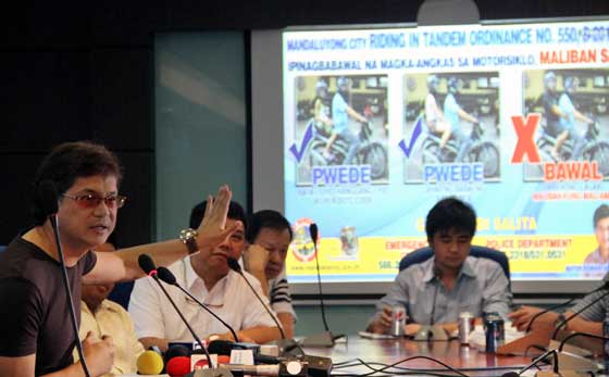 Mandaluyong City Mayor Benhur Abalos discusses an ordinance just passed by the city council that seeks to ban riding in tandem. Under the ordinance, women, children and adult males related to the motorcycle driver will not be slapped penalties. PHOTO BY MIKE DE JUAN