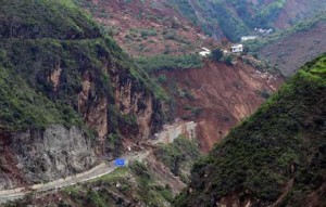 This photo taken on Monday shows an overhead view of a road buried by landslide after a 6.1 magnitude earthquake hit Ludian county in Zhaotong, in southwest China’s Yunnan province. AFP PHOTO