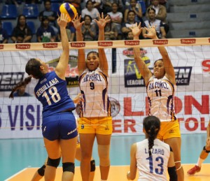 Air Force’s Judy Caballejo and Liza Deramos put up a wall to deflect Ateneo’s Miren Gequillana’s hit during their sudden death for the last semifinals berth in the Shakey’s VLeague Season 11 Open Conference at The Arena in San Juan. CONTRIBUTED PHOTO