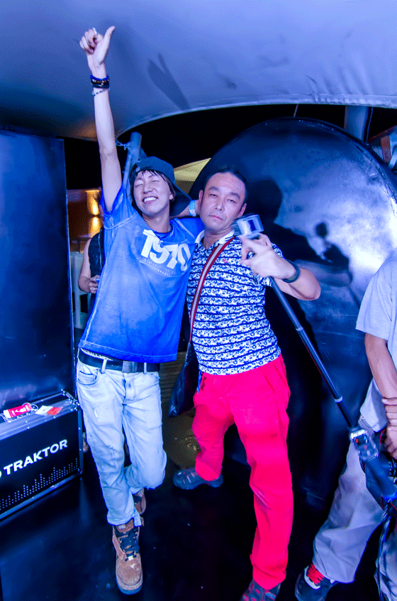 DJ Kamiyami Seigo (left) from 3 Faith with a friend