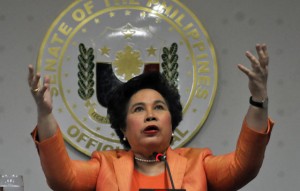  Sen. Miriam Santiago gestures as she talks to reporters after walking out of a committee hearing on Wednesday. PHOTO BY EDWIN MULI 