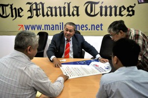 BAIC President and CEO George Chua in a roundtable discussion with The Manila Times President and CEO/ Executive Editor Dante “Klink” Ang 2nd and Times editors and reporters on Tuesday. PHOTO BY EDWIN MULI