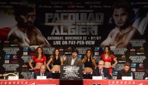 Boxers Manny Pacquiao (center) speaks at a press conference with fellow boxer Chris Algieri (right) in Los Angeles, California on Wednesday (Thursday in Manila) during a promotion tour for their upcoming welterweight bout on November 22, 2014 in Macau. AFP PHOTO