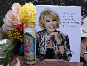 Flowers are placed on the Hollywood Walk of Fame Star for Joan Rivers in Hollywood, California on Friday, following news of the comedian’s death in New York City at the age of 81. AFP PHOTO