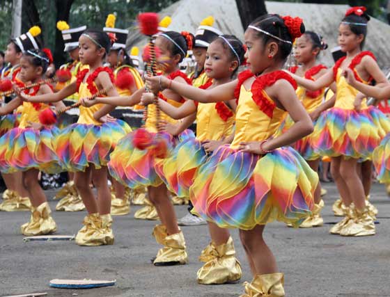  Majorettes of the Corazon Aquino Elementary School drum and lyre corps perform at the Quezon Circle on Saturday during the celebration of the Boy Scouts of the Philippines’ Diamond Jubilee. PHoto BY Mike de jUan