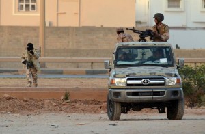 Libyan men loyal to general Khalifa Haftar take position during clashes against Islamists in the eastern city of Benghazi on June 2, 2014 AFP/File