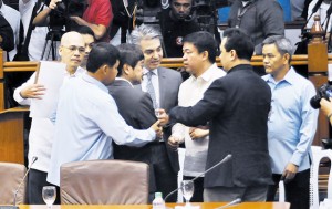 SENATE CONFRONTATION   United Nationalist Alliance (UNA) officials Rep. Toby Tiangco and  JV Bautista argue with Senators Antonio Trillanes 4th, Aquilino Pimentel 3rd, and Alan Peter Cayetano after they  were banished Thursday from the Senate blue ribbon subcommittee hearing on the allegedly overpriced Makati City Hall Building II.   PHOTO BY  EDWIN MULI 