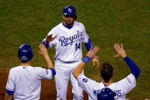 Omar Infante (C) of the Kansas City Royals returns to the dugout during Game Two of the World Series against the San Francisco Giants, at Kauffman Stadium in Kansas City, Missouri, on October 22, 2014 Getty/AFP - ED ZURGA