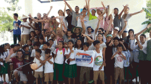 The 40-member student-humanitarian delegation from Israel together with students from the Magtanggol Integrated School in Muñoz, Nueva Ecija