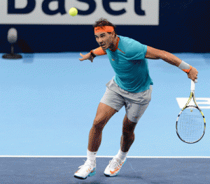 Rafael Nadal of Spain returns a ball to Simone Bolelli of Italy during their game at the Swiss Indoors ATP 500 tennis tournament in Basel. AFP PHOTO