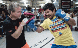 PACQUIAO HONES PUNCHES Philippine boxing icon Manny Pacquiao (right) takes part in a sparring session during a media call in Hong Kong. Pacquiao toured Hong Kong ahead of his World Boxing Organization title defense against undefeated Chris Algieri of the US, to be held in Macau on November 22. AFP PHOTO