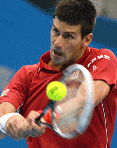 Novak Djokovic of Serbia returns a shot to Andy Murray of Britain during the men’s singles semifinal match at the China Open tennis tournament in the National Tennis Center of Beijing. AFP PHOT