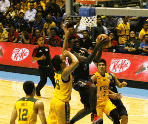 Alfred Aroga of the NU Bulldogs fires a shot vs. the FEU Tamaraws in Game 2 of the 77th season of the UAAP at the Smart Araneta Coliseum on Wednesday. PHOTO BY MIGUEL DE GUZMAN