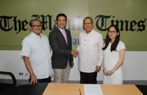 NEW PACT Consul Thelmo “Buddy” Cunanan Jr. and The Manila Times College President Dr. Isagani Cruz shake hands after the signing of the agreement with Caucasus University of Georgia. With them are TMTC Dean Rene Q. Bas and Assistant to the President Ma. Preciosa Monica DV Ang.  PHOTO BY MELYN ACOSTA