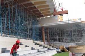 A worker takes a breather from work at the Quirino Grandstand which is undergoing a facelift in preparation for the visit of Pope Francis in January. PHOTO BY RUY L. MARTINEZ