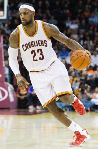 CLEVELAND: LeBron James #23 of the Cleveland Cavaliers drives to the basket during the first half against the Orlando Magic at Quicken Loans Arena on November 24, 2014 in Cleveland, Ohio. AFP Photo 