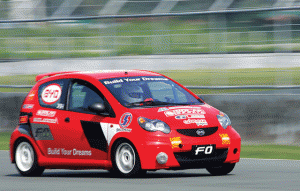 The BYD FO driven by Haw zooms past the grandstand of the Batangas Racing Circuit