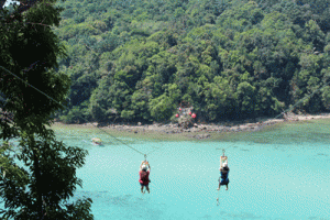 Coral Flyer, a 250-meter zip-line connecting Gaya and Sapi Islands, offers a stunning view of the surrounding