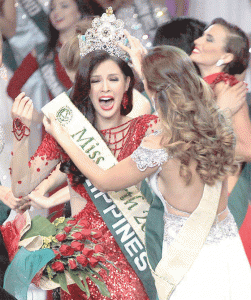 MISS EARTH 2014 Jamie Herrel reacts as she is crowned Miss Earth 2014 during the coronation night at the University of the Philippines theater in Quezon City. PHOTO BY EDWIN MULI