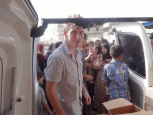 AMERICAN HERO  The photo released by the Kassig Family shows Peter Kassig in front of a truck somewhere along the Syrian border between late 2012 and autumn 2013 as the Special Emergency Response and Assistance was delivering supplies to refugees before the American aid worker was held captive by Islamic State jihadists. AFP PHOTO