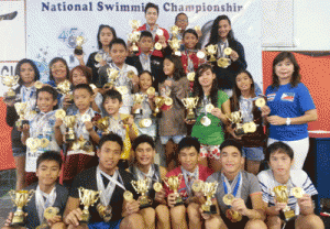 PSL President Susan Papa and Secretary General Maria Susan Benasa with the Most Outstanding Swimmer awardees in the 70th Philippine Swimming League (PSL) Leg Series dubbed as the 2014 Sen. Nikki Coseteng Swimming Championships at the Diliman Preparatory School in Quezon City. CONTRIBUTED PHOTO