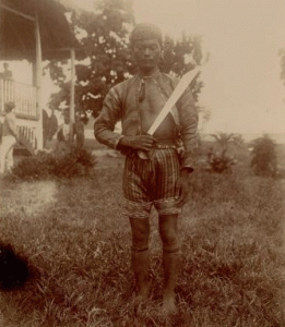 A Bagobo man with a single-edged sword.  PHOTO FROM PHILIPPINE PHOTOGRAPHS DIGITAL ARCHIVE, SPECIAL COLLECTIONS LIBRARY, UNIVERSITY OF MICHIGAN