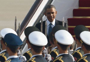 PIVOTAL SUMMIT  United States President Barack Obama walks down the stairs after disembarking from his plane at Beijing’s international airport on Monday as he arrives to take part in the Asia Pacific Economic Cooperation (APEC) Summit. Top leaders and ministers of the 21-member APEC grouping are meeting in Beijing from November 7 to 11. AFP PHOTO