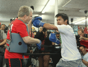 Freddie Roach (left) and Manny Pacquiao