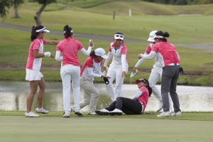 Princess Superal (on the ground) gets a douse of water from ICTSI teammates as they celebrate her victory in the ICTSI Sherwood Ladies Championship. CONTRIBUTED PHOTO