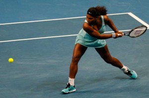 POWER PLAY Serena Williams returns the ball during her match with Kirsten Flipkens on the final day of the International Premiere Tennis League. PHOTO BY MIGUEL DE GUZMAN 