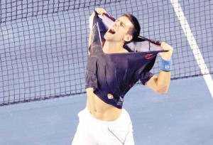 Novak Djokovic of Serbia ripping his shirt off as he celebrates his victory over Rafael Nadal of Spain in the men’s final match on day 14 of the 2012 Australian Open tennis tournament. Djokovic will reveal “never before told” stories about his life in a short documentary series in partnership with an Australian sponsor, on December 1. AFP PHOTO